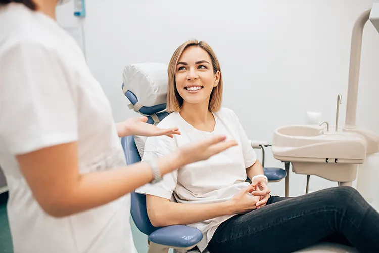 Dentist consulting a patient - Harmony Family Dentistry in Vancouver WA