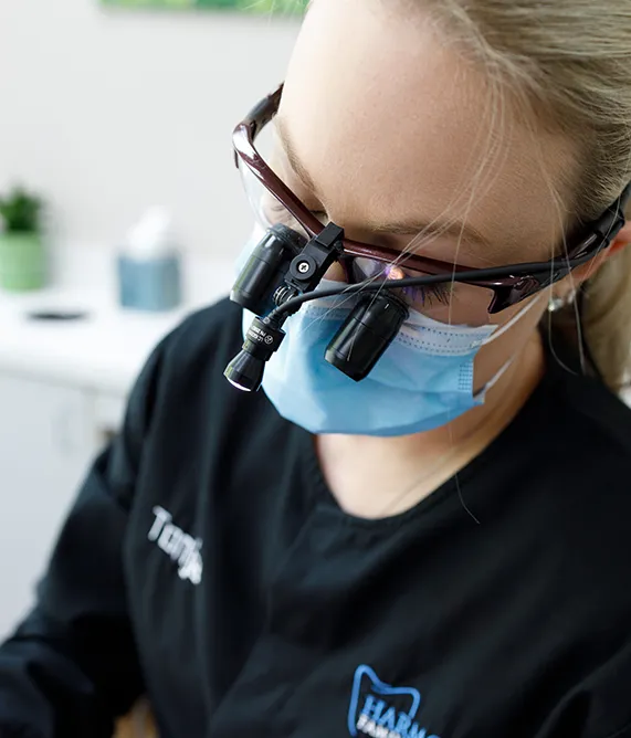 Dental technician with headlight on their glasses - Harmony Family Dentistry in Vancouver WA
