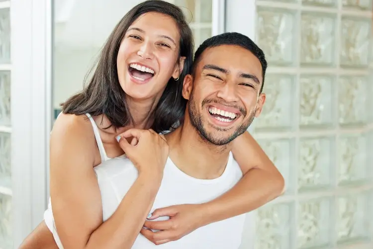 smiling couple showing off beautiful smiles after bioclear matrix treatment in vancouver wa